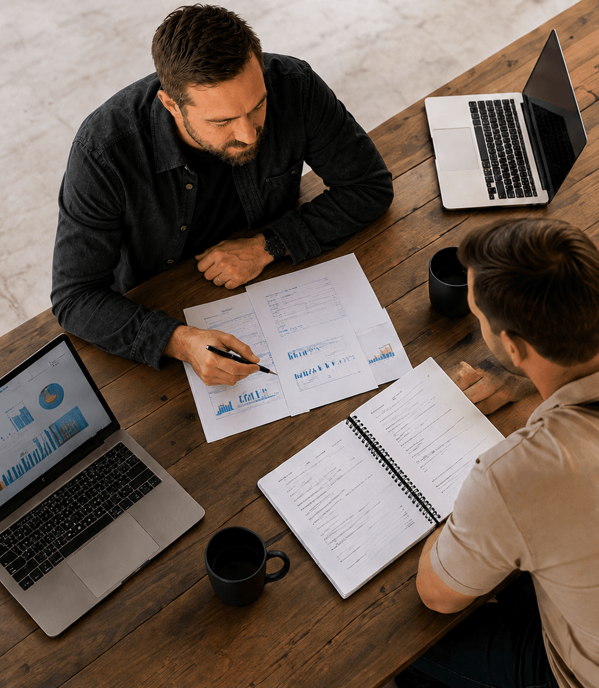 Business reports and advisory notes arranged on a desk